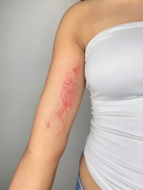 Asian Arm Tattoo, Red Envelope Tattoo, Japanese Charm Tattoo, Asian Tattoo Ideas, Red Arm Tattoo, Red Fine Line Tattoo, Lucky Charm Tattoo, Vietnamese Tattoo Ideas, Envelope Tattoo