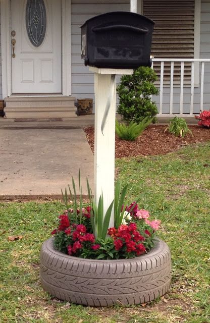 Mailbox tire planter Tire Hacks, Mailbox Planter, Mailbox Makeover, Mailbox Landscaping, Tire Garden, Tire Planters, Mailbox Post, Pallets Garden, Outdoor Decor Backyard