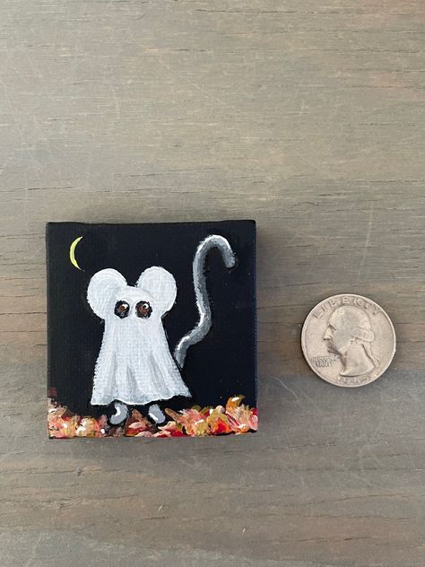 Trick or treat! Fun and festive painting of a mouse in a classic ghost costume...perfect for Autumn and Halloween.  This is an original, signed acrylic painting.   PLEASE NOTE: Easel can be added on by selecting drop down box and choosing "Paintings + easel."  This mini art would add a sweet accent to any room, tablescape, or mantelscape. What a fun gift for the Halloween lover or party host! The mouse painting is  2 inches by 2 inches and would be cute displayed on a shelf, ledge or in a china Trick Or Treat Artwork, Easy Painting Ideas For Halloween, Mini Halloween Canvas Paintings, Cute Halloween Paintings, Ghost Portrait, Shelf Ledge, Idea Paint, Halloween Canvas Art, Autumn And Halloween