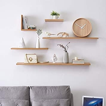 Wall Shelf Decor Office, Wall Mounted Display Shelves, Shelf On Bedroom Wall, Asymmetrical Wall Shelves, Wall Shelf Display Ideas, Oak Floating Shelves Living Room, Asymmetrical Floating Shelves, Photo Wall Shelves, Floating Shelves Wall Decor