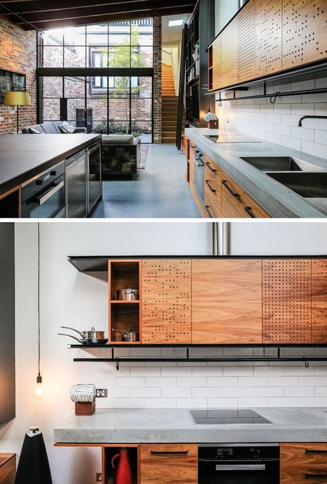 This industrial modern kitchen features a concrete countertop, wood cabinets and black hardware. Small holes have been used to create an artistic pattern on the light wood upper kitchen cabinets. Kitchen Cabinets Light Wood, Industrial Modern Kitchen, Kitchen Cabinet Inspiration, Replacing Kitchen Countertops, Upper Kitchen Cabinets, Outdoor Kitchen Countertops, Light Wood Cabinets, Outdoor Kitchen Cabinets, Industrial Kitchen Design