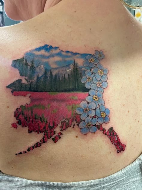 The mountains and trees are the view from my front porch, then added the fields of fireweed and the forget me knots down the side, now wherever I am I'll have a little bit of Alaska with me! Alaska Tattoos For Women, Alaska Tattoo Ideas Simple, Alaska Inspired Tattoos, Idaho Tattoo Ideas, Fireweed Tattoo, Alaska Tattoo Ideas, Alaskan Fireweed Tattoo, Alaska Tattoo, State Tattoos