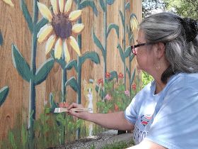 Word Weaver Art: Sunflower Mural on Fence - Redo Flower Mural Outdoor, Fence Mural Ideas Backyards, Fence Art Painting, Painted Fences Mural, Mural Fence, Fence Painting Ideas, Fence Murals, Painted Fences, Fence Flowers