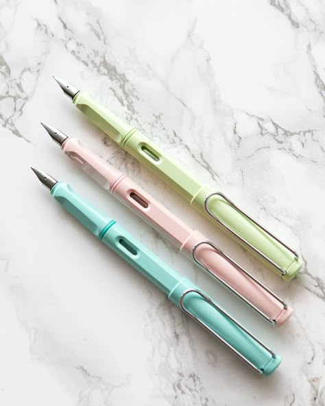 LAMY Safari Pastel Fountain Pens: Mint Glaze, Blue Macaron, and Powder Rose. Aesthetic Fountain Pen, Cute Pens Aesthetic, Fountain Pen Aesthetic, Lamy Pen, Blue Macaron, Hogwarts Script, Lamy Fountain Pen, Lamy Safari, School Pens