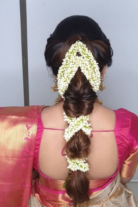 Introducing latest Bridal Hairstyles for South Indian Brides. #weddingbazaar #indianwedding #bridalhairstyle #southindianweddings #southindianbride #southindianhairstyleforsaree #southindianhairstylesimple #southindianhairstylebridal #southindianhairstyletraditional #southindianhairstylelehenga Front Hair Styles For Brides Indian, Muhurtham Jadai Front Hairstyle, Hairstyle For Engagement Bride In Saree, Hairstyles For Traditional Saree, Braided Hairstyles For Saree, Hairstyles For South Indian Wedding, Hair Styles For Marriage, Muhurtam Hairstyles, Wedding Saree Hairstyles