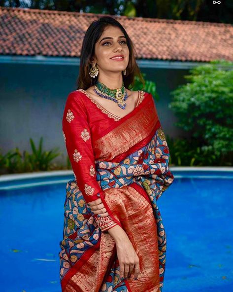 Hues And Shades By Anjali on Instagram: “Timeless Kalamkari Art with natural Handfyes and haindpainted on pure Kanjivaram saree complimented with a beautifully handcrafted blouse.…” Red Silk Saree With Kalamkari Print, Festive Red Saree With Kalamkari Print, Red Art Silk Saree With Kalamkari Print, Traditional Red Kalamkari Print Blouse, Kalamkari Applique Work Sarees, Designer Lehangas, Kalamkari Blouse Designs, Kalamkari Art, Sari Blouses