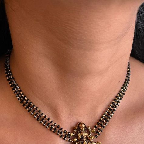 Creative Gems and Jewellery on Instagram: "Featuring Stunning black beads choker with goddess Lakshmi  Shop now   Handcrafted by the karigars of jaipur in silver925 with 24k gold and Kundan finish   Handcrafted in silver925  DM or WhatsApp for order or details : Ph 9686689890 . . . Creative Gems and Jewels  We are a luxury silver 92.5 jewellery designer brand based out of Bangalore , India  We design and customise Jewellery using the finest gemstones from across the world. Which is then handcrafted by the best artisans in india.  Creative Gems and Jewels Located at  INDIRANAGAR | COMMERCIAL STREET  Bangalore India  Dm or whatsapp for more details  #silverjewellery  #polki #designerjewelry #creativegemsandjewels #silvervictorianjewellery #victorianjewellery #blackbeads #moissanitejewelry  # Black Beaded Jewelry Indian Gold, Black Beads Choker, Commercial Street Bangalore, Mangalsutra Design, Black Beads Mangalsutra, Black Beads Mangalsutra Design, Beads Choker, Commercial Street, Mangalsutra Designs