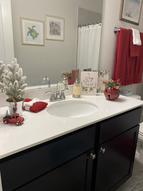 Vanity Christmas Decorations, Inside House Christmas Decorations, Christmas Restroom Decor Ideas, Christmas Theme Bathroom, Christmas Themed Bathroom, Christmas Vanity Decor, Bathroom Decorated For Christmas, Bathroom Sink Christmas Decor, Christmas Decor In Bathroom