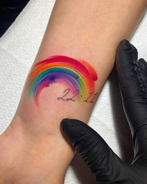 Colorful Tattoos For Women Watercolors, Rainbow Wrist Tattoo, Rainbow Tattoos For Women, Rainbow Baby Tattoo Ideas, Rainbow Tattoo Ideas Unique, Rainbow Baby Tattoo, Rainbow Tattoo Ideas, Pride Tattoo Ideas, Baby Tattoo Ideas