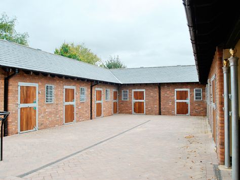 Brick stable yard, UK  http://www.holland-build.co.uk Brick Stables, Smallholding Ideas, Stable Plans, Minecraft Barn, Dream Barn Stables, Stable Yard, Stable Ideas, Property Ideas, Horse Barn Plans