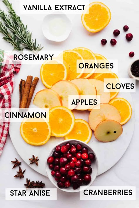 Create a holiday home with this Christmas simmer pot blend. This safe and toxic-free stovetop potpourri will infuse the air with a warming December scent. You can use this Christmas simmer pot every day for several days. - #christmassimmerpot #simmerpot #holidaypotpourri #christmaspotpourri Christmas Pot Simmer Recipe, Simmer Pot For Christmas, Christmas Scent Simmer Pot, Simmer Pot Christmas Recipes, Drying Fruit For Simmer Pot, Make Your House Smell Like Christmas Simmering Potpourri, Xmas Simmer Pot, Christmas In A Pot, Nye Simmer Pot