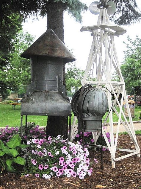 Garden art.  Yup went to an auction to buy these, they had both styles of barn vents and 9 in total. OMG they sold for $45 each.   There goes that wish. Anyone want to get rid of one or two-not at that price! Flea Market Gardening, Unique Garden Art, Garden Totems, 17 December, Garden Junk, Arts And Crafts House, Garden Whimsy, Outdoor Stuff, Unique Gardens