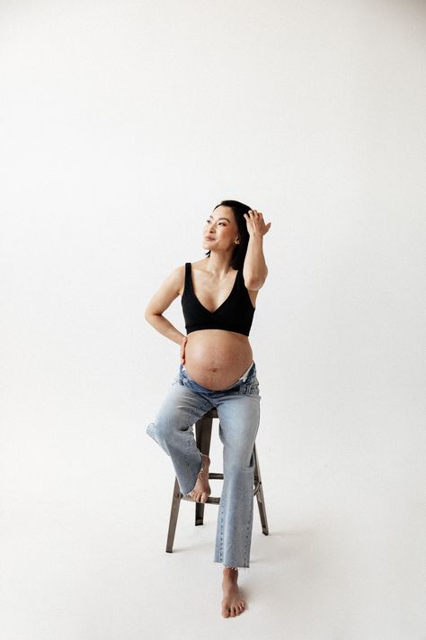 Simple Studio Maternity Shoot, Studio Maternity Shoot Jeans, Minimal Maternity Shoot, Studio Style Maternity Photos, Studio Pregnancy Photoshoot, Maternity Photo Shoot White Backdrop, Minimalist Maternity Shoot Studio, White Back Drop Maternity Shoot, Indoor Maternity Photos