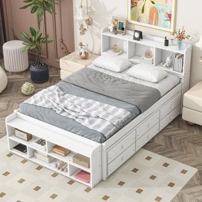 The Modern Platform Wood Bed with Bookcase Headboard, Underbed Storage Drawers and End Storage Box offers smart storage solutions without sacrificing style. Every inch of space is maximized for practicality and visual appeal. Color: White | Red Barrel Studio® Aylissa Standard w / Drawers 41.2 H x 57.5 W x 92.8 D in, Wood in White | Full | Wayfair Full Beds Ideas Small Rooms, Storage Ideas For Small Bedrooms Adults, Beds With Storage Underneath, Full Size Bed With Storage, Platform Wood Bed, Cozy Bedroom Furniture, Bed With Drawers Underneath, Photobooth Pics, Bedroom Inspirations Master