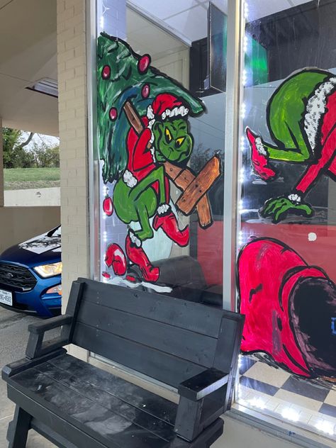 The grinch stealing christmas tree. Grinch Christmas Window Display, Grinch Window Painting Ideas, The Grinch Window Painting, Grinch Window Art, Grinch Stealing Christmas Tree, Grinch Window Painting, Edward Jones, Painted Windows, Christmas Window Painting