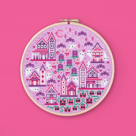 Cross stitch pattern of a sweet but spooky town. This pattern is inspired by Valloween, a mix of Halloween and Valentine's Day. Mixing the best of both worlds, this detailed town will delight you: the Victorian style houses, the purple graveyard, the pink moon and all the tiny and cute ghosts and bats. Take a walk through Valloween town and discover all of its secrets! Grab your needles, prepare some hot cocoa and start stitching this project! It's super fun to stitch and the result is cute as hell. Do you like this pattern? You will find more Valloween themed patterns like this tiny spooky garden on my shop: https://www.etsy.com/listing/1396732784  * The pattern * This listing is for a digital PDF, not a finished product! The PDF includes: - A mockup of the finished embroidery for referen Purple Graveyard, Spooky Cross Stitch, Gothic Cross Stitch, Pink Cross Stitch, Everything Cross Stitch, Unicorn Cross Stitch Pattern, Stitch Witchery, Halloween Cross Stitch Patterns, Wedding Cross