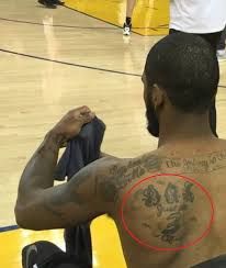 Kyrie Irving's 21 Tattoos & Their Meanings – Body Art Guru Kyrie Irving Tattoos, Kyrie Tattoo, Humble Tattoo, Hand Eye Tattoo, Left Arm Tattoos, H Tattoo, Back Of Neck Tattoo, Faith Tattoo, Wings Tattoo