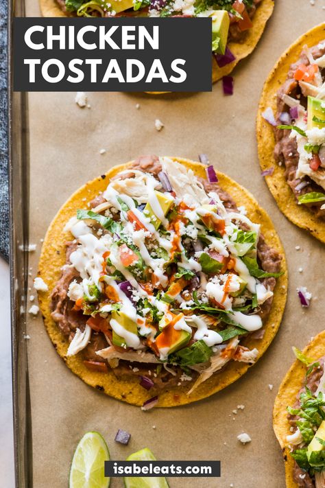 These chicken tostadas are a quick and easy weeknight dinner! Made with crispy tostada shells, shredded chicken, refried beans, and all the best toppings. Tostada Shells, Isabel Eats, Canning Refried Beans, Tostada Recipes, Chicken Tostadas, Mexican Chicken Recipes, Mexican Dinner, Quick Appetizers, Easy Weeknight Dinner