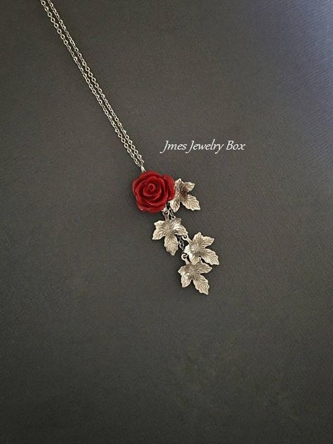 Beautiful red resin rose with dangling silver leaves. Detailed stainless steel leaves measure 15.5mm x 11mm. Total pendant length with rose and leaves is just over 2 inches. This necklace is 18'' long with lobster clasp. *15mm Resin rose *Stainless steel chain *Stainless steel leaves *Handmade with love <3 Like Jmesjewelrybox on Facebook for updates on new jewelry, upcoming sales and giveaways! Plus Facebook fans save 5% :D Find the coupon code on Jmesjewelrybox's cover photo https://www.face Silver Rose Earrings, Red Rose Necklace, Rose Jewelry Flower, Black Rose Jewelry, Rose Necklaces, Red Rose Jewelry, Rose Branch, Rose Accessories, Resin Rose