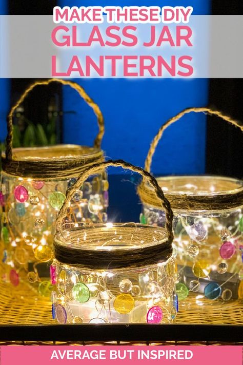 Make these colorful glass jar lanterns and light up your outdoor space this summer! These DIY lanterns look great during the day because of their colorful accents, and look even better at night as the light dances through the colored gems. Find the full instructions in this post. #diylantern #glassgemlantern #glassgemcrafts Glass Jar Gift Ideas, Homemade Lanterns, Rustic Gardening, Fairy Lights In A Jar, Lantern Crafts, Gardener Aesthetic, Homemade Garden, Mason Jar Luminaries, Crafts With Glass Jars