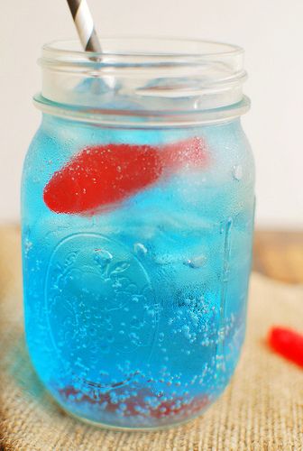 Ocean Water - 7Up or Sprite, blue food coloring, & Swedish Fish.  Fun for kids & summer parties. Swedish Fish, Blue Food Coloring, Kid Drinks, Blue Food, Blue Curacao, Toddler Snacks, Hawaiian Party, Snacks Für Party, Water Recipes