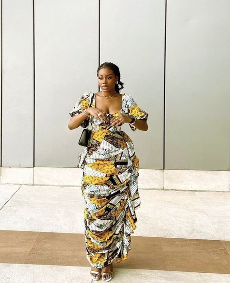 Off Shoulder Ankara Gown Styles, Floral English Satin Dress Designs, Midi Ankara Dress Classy, Classy African Outfits, Ankara Party Dress Classy, African Print Gowns, African Wear Dresses Classy, Modern Ankara Dress Styles, Modern African Dresses Ankara