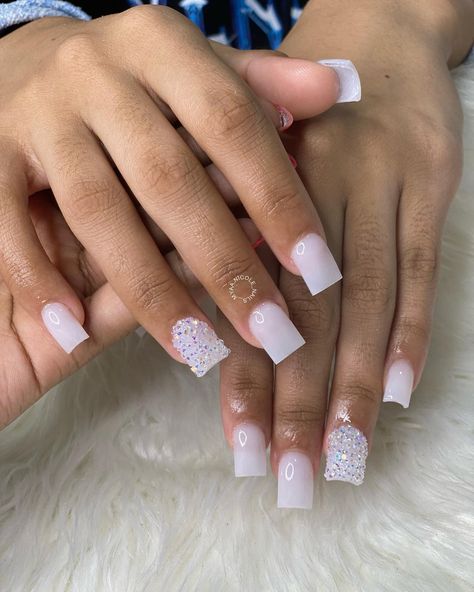 Short white nails are sophisticated and stylish for every occasion. There are many looks to choose, from casual to glam. Check out 19 short white nail ideas. Click the article link for more photos and inspiration like this // Photo Credit: Instagram @__myaa.nicole_nails // #nailaddict #nailart #nailartist #naildesign #naildesigns #nailideas #nailinspiration #nailporn White Freestyle Nails Acrylic Short, Nails Acrylic Short Pink And White, White Silver Nails Short, Short White Nails Diamonds, Cute Gel Nails White, Cute White Short Nails Designs, White Nail With Accent Nail, Homecoming Short Nails, Short Acrylic Nails For Graduation