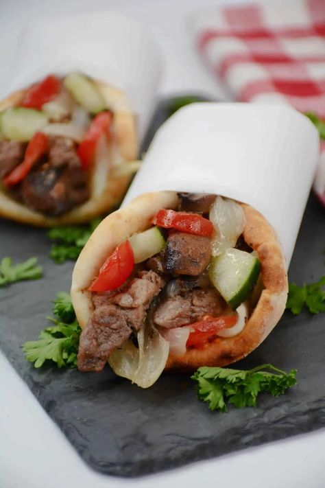 Greek Steak Pita with Caramelized Onions and Mushrooms Steak Pita, Greek Steak, Caramelized Onions And Mushrooms, Pita Recipes, Top Sirloin Steak, Quick Dinners, Wanting More, Treat Ideas, Dinner Meals