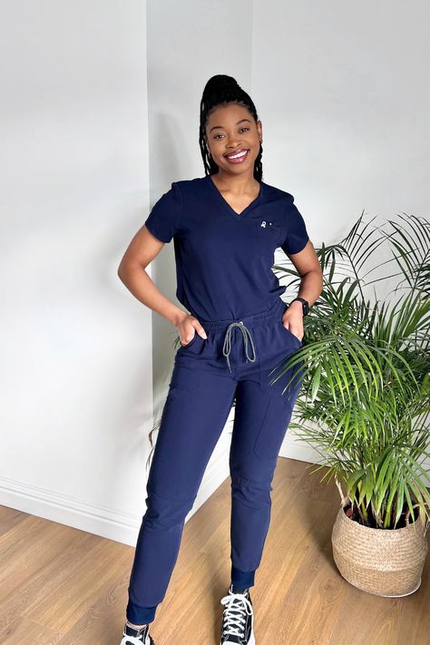 Koi Next Gen scrubs are made from a moisture-wicking, stretchy fabric that offers maximum comfort and flexibility. They provide a premium professional look while also having a relaxed and comfortable fit. Simple and stylish! The Ready to Work top features one chest pocket making it perfect for tucking, if that’s your style. The Good Vibe jogger combines a professional style with ultimate comfort for trousers that feel great on everyone. 📸edith_dentaltherapist Nurse Dress, Nurse Dress Uniform, Koi Scrubs, Scrub Style, Work Uniform, Professional Style, Work Uniforms, Nursing Dress, Professional Fashion