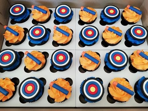 Nerf Cupcakes, Nerf Party Table, Nerf Party Games Activities, Nerf Party Food, Nerf Themed Birthday Shirts, Musical Cakes, Nerf Cake, Ice Cream Cone Cupcakes, Nerf Birthday Party