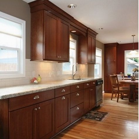 granite countertops for cherry cabinets Cherry Wood Kitchen Cabinets, Mahogany Kitchen, Cherry Wood Kitchens, Cherry Wood Cabinets, Light Granite, Refacing Kitchen Cabinets, Cherry Kitchen, Cherry Cabinets, New Kitchen Cabinets