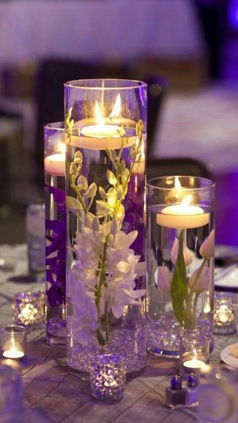 7 Exceptional Purple Color Combos to Rock for 2019---floating candle wedding centerpieces with purple and white flowers, diy wedding reception table settings for fall and winter dinner reception Purple Centerpiece, Floating Candle Centerpieces Wedding, Purple Wedding Centerpieces, Floating Candles Wedding, Romantic Wedding Centerpieces, Reception Table Settings, Centerpiece Flower, Floating Candle Centerpieces, Purple And White Flowers