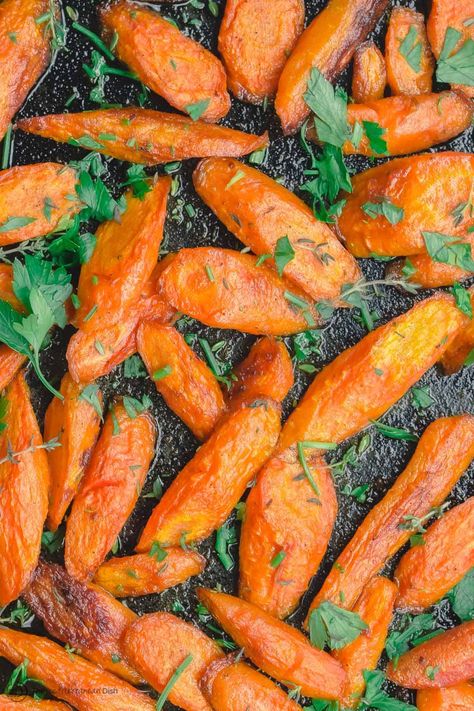 Simple Roasted Carrots Recipe | The Mediterranean Dish Mediterranean Roasted Carrots, Mediterranean Carrot Recipes, Mediterranean Carrots, Balela Salad Recipe, Easy Roasted Chickpeas, Pasta With Onions, Moroccan Vegetables, Carrot Recipe, Roasted Carrots Recipe