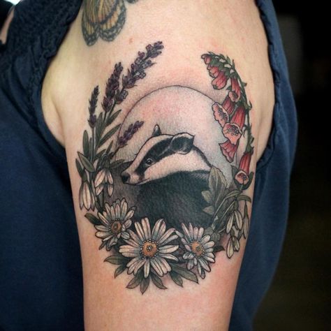 Badger tattoo  Alice Kendall on Instagram: “It’s a buddy badger amongst the daisies, snow drop flowers, foxglove and lavender! @wonderlandpdx” Honey Badger Tattoo, Hufflepuff Tattoo, Skunk Tattoo, Badger Tattoo, Drop Flowers, Science Tattoos, Compass Rose Tattoo, Hp Tattoo, Snow Drop