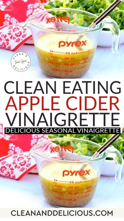 A clear Pyrex measuring cup filled with Clean Eating Apple Cider Vinaigrette featuring apple cider vinegar sits on a white surface. A spoon is inside the cup. In the background, there's a bowl of fresh green lettuce, adding a seasonal twist. A red and white patterned cloth is partially visible. Basic Vinaigrette, Types Of Protein, Salads For Summer, Braggs Apple Cider, Apple Cider Vinegar Recipes, Apple Cider Vinaigrette, Braggs Apple Cider Vinegar, Cider Vinaigrette, Raw Apple Cider Vinegar