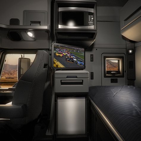 Profile view of the Anthem 70" Stand Up Sleeper interior environment with microwave, television, refrigerator and sleeper bunk. Trucker Hacks, Tesla Semi Truck, Semi Trucks Interior, Old Mack Trucks, Vip Design, Truck Living, Interior Environment, Tactical Truck, Trucking Business