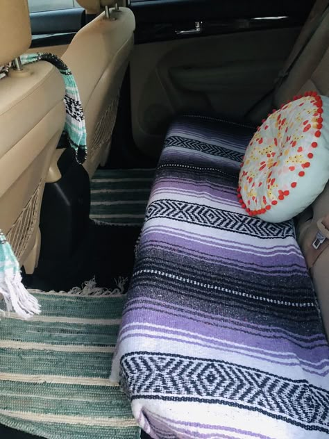 Got the blankets on amazon $15!! Pillow at target for $5!!! Floor Rugs @ World Market!!! $10! Car Backseat Pillows And Blankets, Car Pillows Aesthetic, Boho Car Ideas, Car Rugs Vehicles, Tapestry In Car Roof, Car Accessories Aesthetic Boho, Aesthetic Truck Interior, Car Blanket Aesthetic, Witchy Car Interior