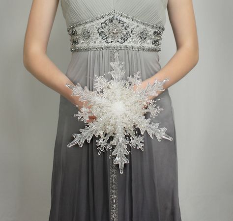 Silver Grey and White Winter Wedding Ideas : Crystal Snowflake Ice Bouquet: Make a statement with this one of a kind ice crystal bouquet which couldn’t be more perfect for a winter bride! Snowflake Bouquet, Frozen Wedding Theme, Christmas Wedding Bouquets, Frozen Wedding, Alternative Wedding Bouquet, Snowflake Wedding, White Winter Wedding, Crystal Bouquet, Winter Wedding Bouquet