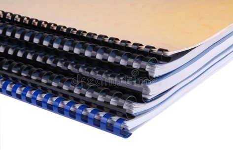 Close-up of a stack of spiral notebooks / reports. Closeup of a stack of spiral , #SPONSORED, #spiral, #notebooks, #Close, #stack, #reports #ad Binding Machines, Binding Machine, Coil Binding, Paper Punch, Spiral Notebooks, Spiral Notebook, Comb, Bedroom Design, Close Up