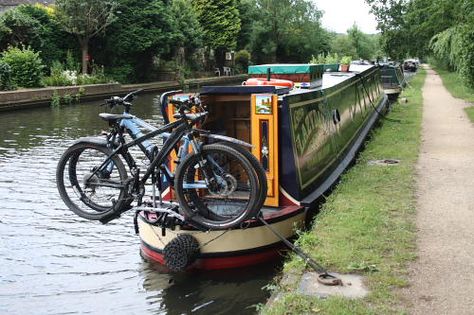 We did not want to have the bikes lying on the roof of the boat, not only does it look messy it’s not good for either the boat or the bikes. Also there is every chance that a careless rope ca… Narrowboat Exterior, Boat Bathroom, Bike And Barge Europe, Speed Boat Interior, Canal Boat Living, Pilothouse Boat, Barge Boat, Amsterdam Houseboat, Canal Barge