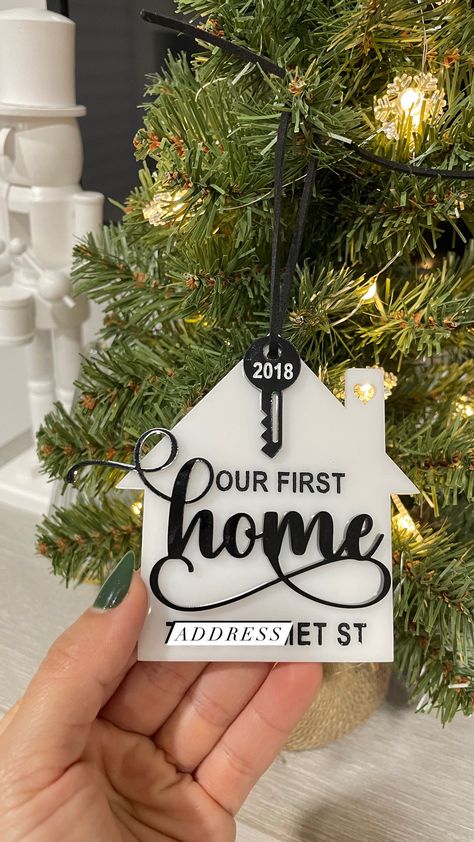 "First time home owner Christmas ornaments are perfect to commemorate a new home, first home, or for a real estate gift for their clients.  Our Christmas ornaments are personalized with the street address and the year the home was purchased. ▪️This Piece is Laser cut and engraved and made of 1/8\" Acrylic   ▪️measures is 4Wx3.7H approx  ▪️Ornament is one sided  ▪️Chiffon Ribbon included  ▪️These are acrylic (plastic) so they can break if dropped or hit against hard surfaces. Please handle with care. We are not responsible for broken ornaments.** **NOT SUITABLE FOR LUGGAGE** Please send me a message if you would like a different color , we have a few colors in stock I would love to see how you decorated your party. Please follow,Tag and share your love on INSTAGRAM @Dydcreations2" First House Key Ornament, 1st Home Ornament, Real Estate Client Christmas Gifts, Business Christmas Gifts For Clients, House Announcement Ideas, Real Estate Gifts For Clients, Realtor Closing Gifts For Clients, Christmas Gifts For Clients, Farm Lights