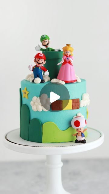 Whitney DePaoli | Sugar & Sparrow on Instagram: "Mini Super Mario Cake 🍄 ⭐️ this was one of three family birthday cakes I had the honor of making this past week! I handmade the landscapes, pipe, stars, blocks, and other little details with fondant + found the tiniest Mario figurines on Amazon to round out the theme. Happy birthday, sweet Lydi! ⁣ ⁣ #supermario #mario #mariocake #birthdaycake #cakesofinstagram #minicake #cakedecorating #cake #bakingfun" Simple Mario Cake, Mario Birthday Party Cake, Mario Theme Cake, Mario Cake Ideas, Cake Super Mario, Super Mario Birthday Cake, Mario Birthday Cake, Mario Bros Cake, Super Mario Cake