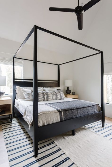 Layered rugs and pillows to create texture in this modern bedroom. Light wood nightstands add a brightness to the space and the blueish bedding brings in more color. Southern Home Decor, Canopy Beds, Four Poster Bed, Four Poster, Poster Bed, Amber Interiors, Bedrooms Decor, Dreamy Bedrooms, Canopy Bed