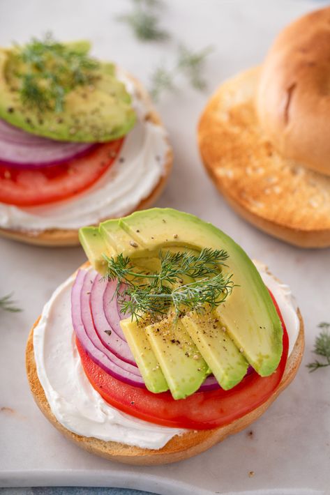 The Perfect Bagel Sandwich: Cream Cheese, Tomato, Red Onion, and Avocado - Eating With Erica Sandwich Cream Cheese, Bagel With Avocado, Tomato Bagel, Cream Cheese Tomato, Bagel Sandwich Recipes, Sandwich Cream, Cheese Tomato, Bagel Sandwich, Avocado Slices