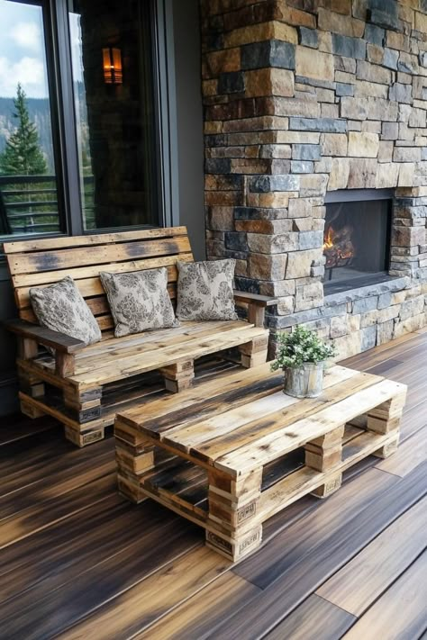 Rustic wooden patio furniture made from repurposed pallets in front of an outdoor stone fireplace. Diy Outside Furniture, Pallet Furniture Outdoor Easy, Diy Pallet Projects For Beginners, Pallet Projects Outdoor, Pallet Table Outdoor, Furniture Made From Pallets, Palet Projects, Pallet Diy Projects, Pallet Deck Furniture