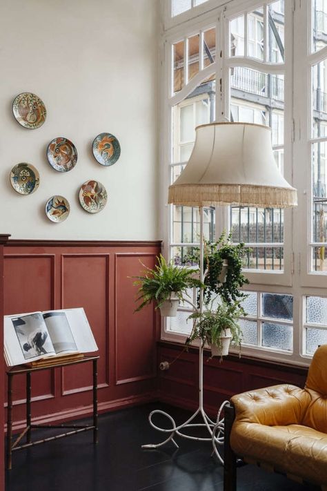 A Revived Catalan-Modernist Apartment: Quintana Partners in Barcelona Barcelona Apartment, Iron Chair, Historic Architecture, Spanish Design, Brick Colors, Halloween Games, Wainscoting, Interior Design Firms, Apartment Design