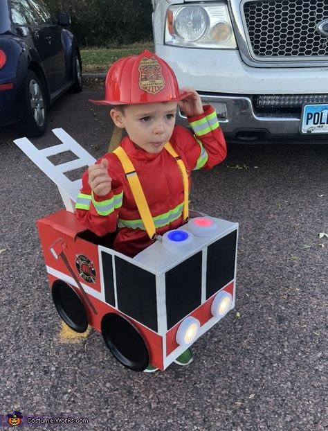 Fire Truck Diy Costume, Homemade Fire Truck Costume, Fire Truck Out Of Cardboard, Firetruck Halloween Costume, Diy Firetruck Costume Cardboard Boxes, Diy Fire Truck Cardboard, Fire Truck Halloween Costume, Fire Truck Costume Diy, Diy Fire Truck Costume