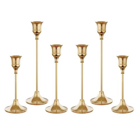 PRICES MAY VARY. VINTAGE VISUAL FEAST: Eelegant and Premium Candle Stick Holder set, the candelabra at different heights create an undulating candlelight creating a romantic and warm atmosphere TAPER CANDLE HOLDE: Skilled craftsmen use high quality metal to create each luxurious candle holder. The sturdy and heavy round base has a non-slip velvet base that does not shake easily CANDLESTICKS HOLDER BULK: The candle holders are available in three lengths - S:6.0 '' X 2.5''; M:7.6'' X 2.5''; L:9.3' Gold Candle Holder Centerpieces, Bud Vase Centerpiece, Gold Candlestick Holders, Led Taper Candles, Decor Centerpieces, Vintage Candlestick Holders, Tapered Candle, Candle Stick Holder, Gold Candle Sticks