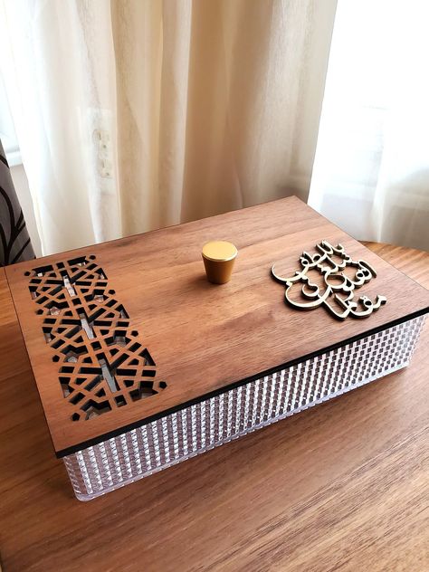 Acrylic box with walnut veneer lid with our Negma pattern and side Arabic calligraphy.  Dimensions:10" x 6 3/4" x 2 1/2" Diy Doll Suitcase, Watch Animation, Ramadan Design, Textile Weaving, Ramdan Kareem, Dry Fruit Box, Acrylic Containers, Laser Cut Decor, Laser Cut Box