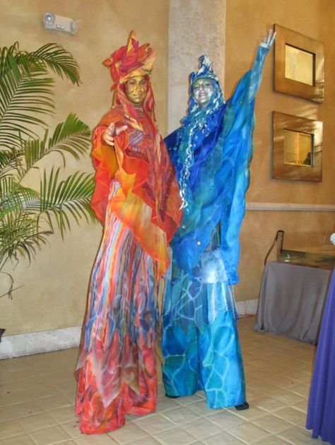 Fire and Water original Stilt walkers Earth Wind And Fire Costume, Earth Wind Fire Water Halloween Costume, Fire And Water Costume, Elements Costume Air, Water Element Costume Ideas, Water Inspired Costume, Water Costume, Fire And Water, Sun And Water